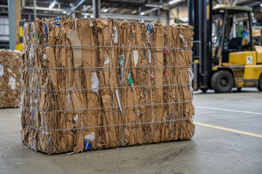 Finished cardboard bale secured with steel baling wires