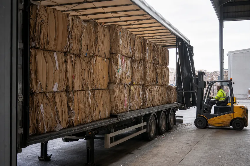 Mill size bales loaded for transport